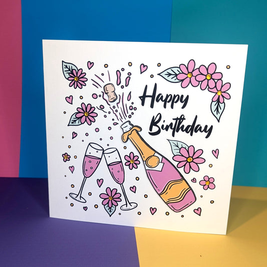 Pink Champagne and Flowers Birthday Card