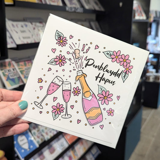 Pink Champagne and Flowers  Penblwydd Hapus (Birthday Card) - Welsh Card